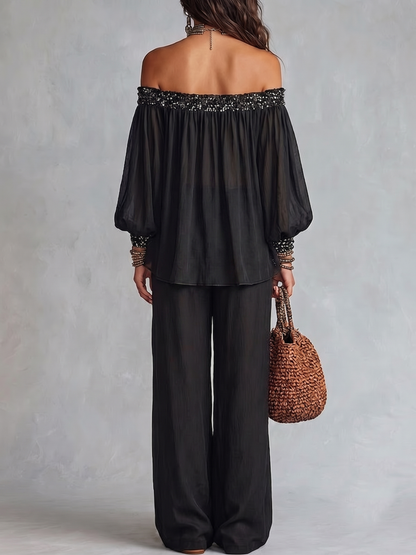 Daria | Conjunto de top negro con hombros al aire y lentejuelas y pantalón ancho con cordón