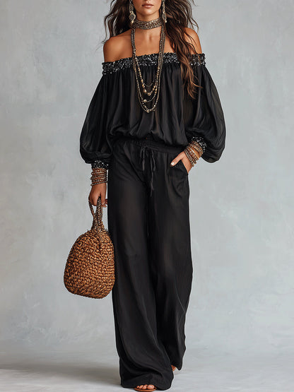 Daria | Conjunto de top negro con hombros al aire y lentejuelas y pantalón ancho con cordón
